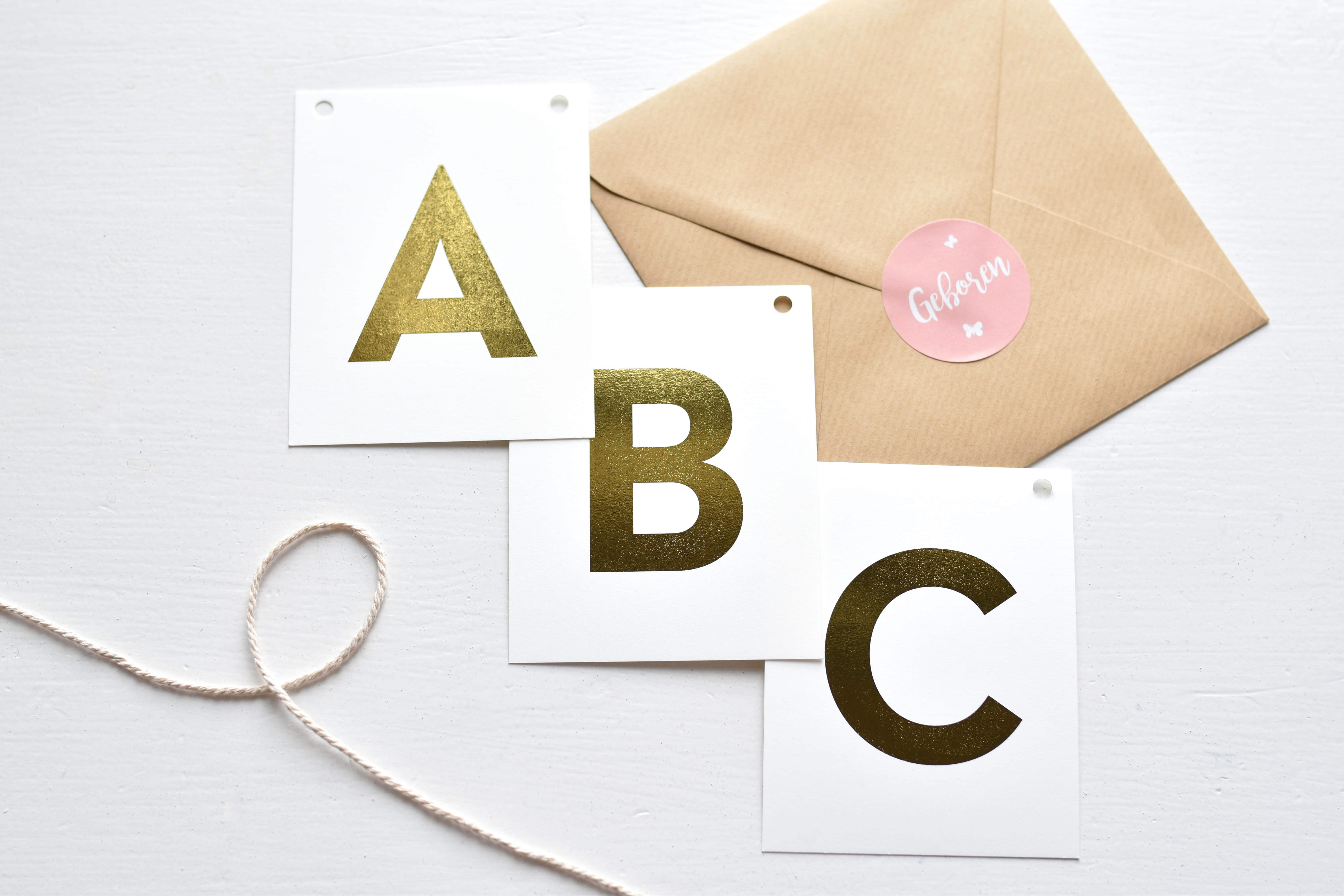 Naamslinger met gouden letters